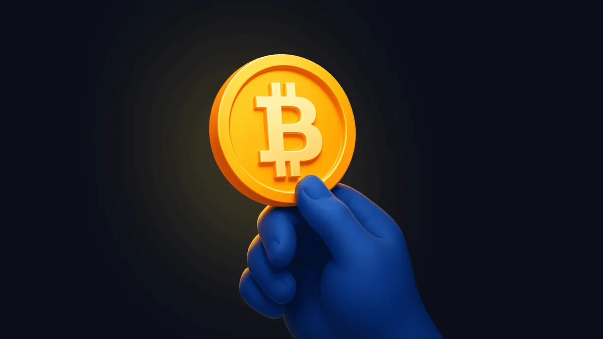 A stylised hand holding a Bitcoin token, representing custody of a digital asset